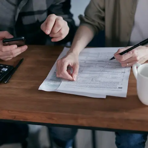 people figuring out their bill payments