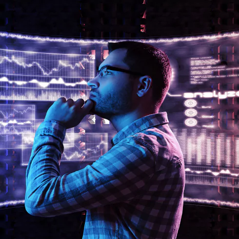 man looking at the stockmarket analysis